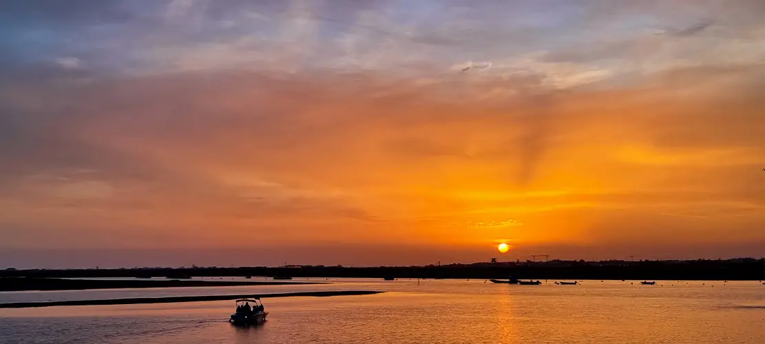 Portugal, Faro, Sunset over harbour